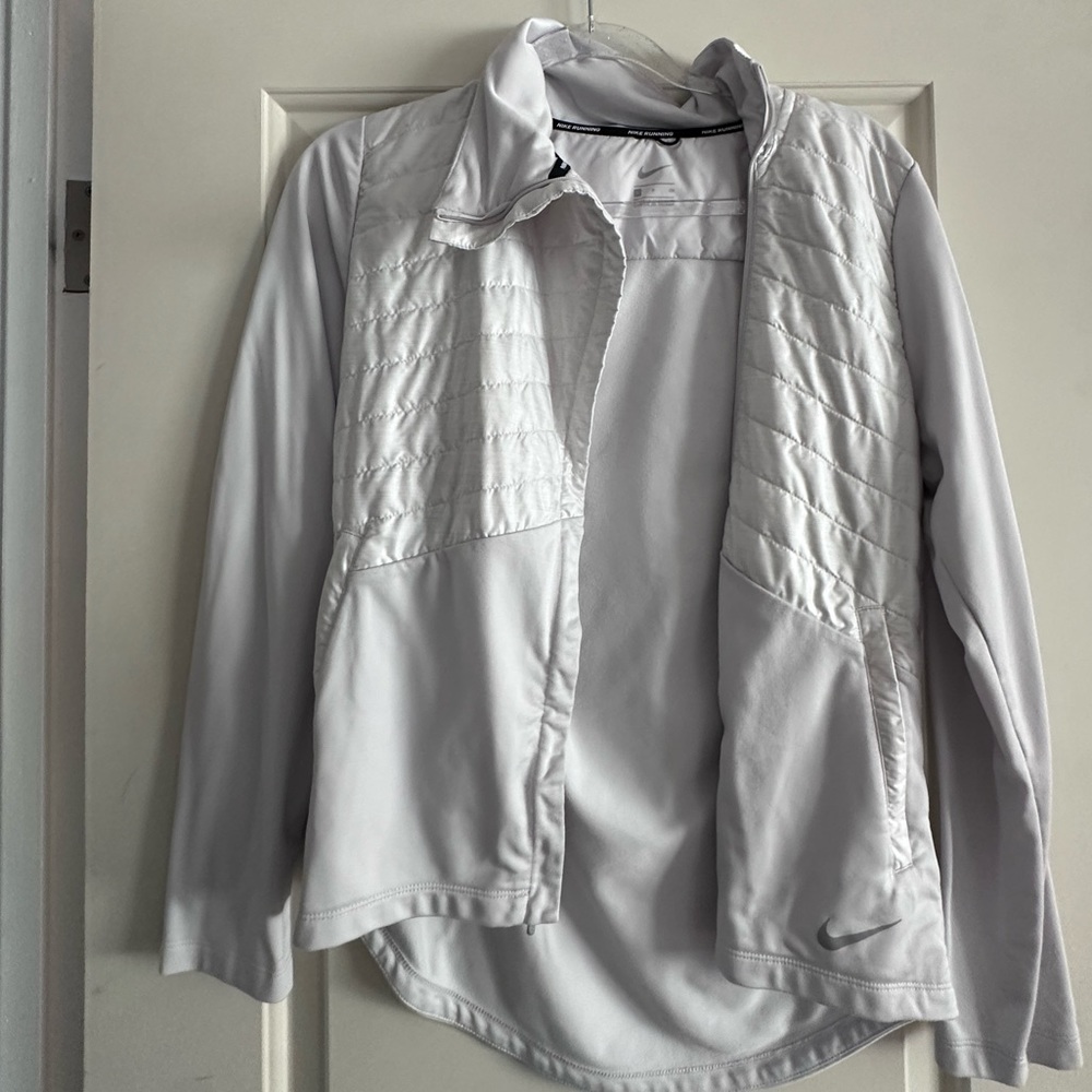 Nike running jacket. Lightly used. Size small.